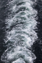 view from a ferry on the suction of a ship's screw