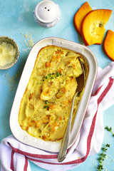 Pasta baked with pumpkin and ricotta in a cream sauce.Top view.