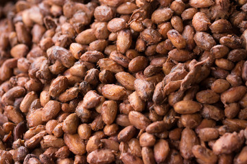 Fermented and fresh cocoa-beans lying in the wooden box