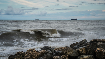 container ship at sea during a storm