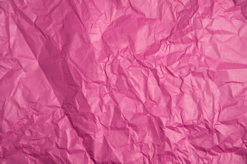 Fototapeta premium Crumpled pink paper texture