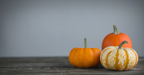 Pumpkins on wooden table