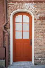 Fototapeta na wymiar Red Door in the French Quarter