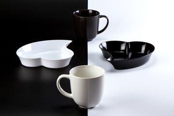 Fresh pastries and coffee with milk on a contrasting background