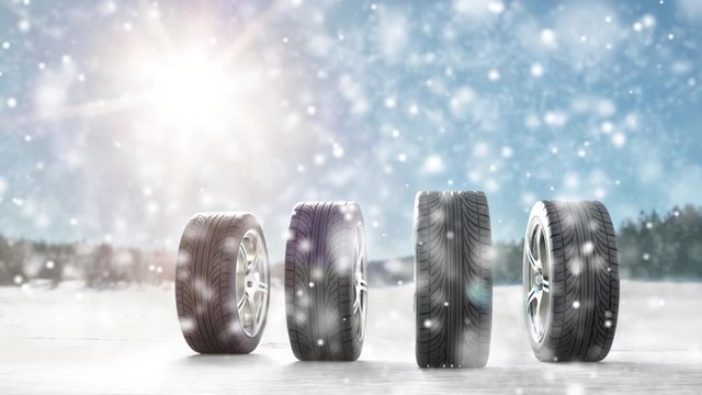 Winterreifen im Schnee Fall im Sonnenschein