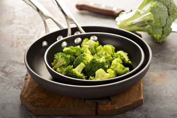 Steamed or stewed broccoli in a skillet