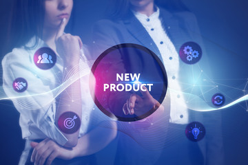 The concept of business, technology, the Internet and the network. A team of business women working on the virtual screen of the future and see the inscription: New product