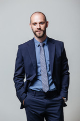 Successful businessman. Portrait of confident young man in formalwear looking at camera