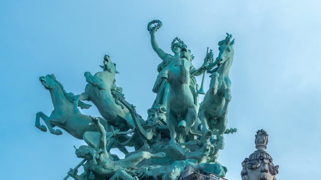 Statue atop the Grand Palais on the Champs Elysee timelapse. Paris, France