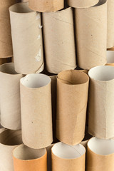 Empty toilet paper on white background