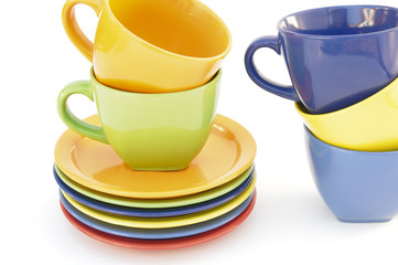 colored cups and plates