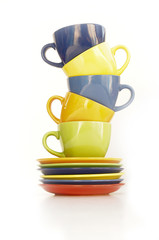 colored cups and plates