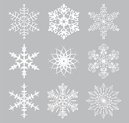Naklejka na ściany i meble vector set of 9 white snowflakes