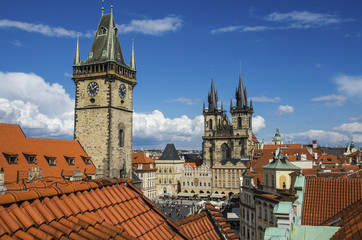 Fototapeta premium Houses with traditional red roofs in Prague Old Town Square in the Czech Republic