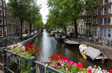 Foto op Plexiglas Amsterdam Canal with Flowers © Alysta