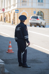Traffic services. A police traffic services, standing on the post
