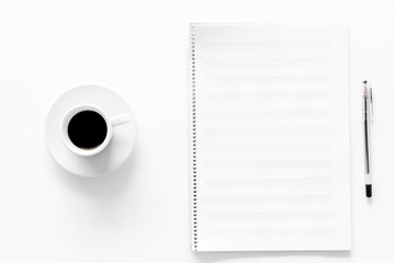 Compose music. Music notes and cup of coffee on white background top view