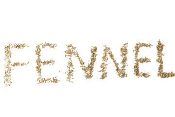 Inscription from fennel seeds on white background