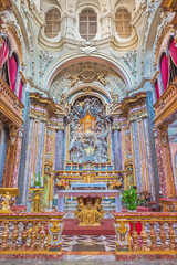 Fototapeta na wymiar TURIN, ITALY - MARCH 16, 2017: The main altar and the presbytery in baroque church Chiesa di Santa Maria di Piazza.