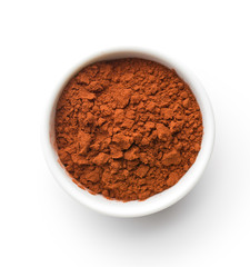 Tasty cocoa powder in bowl.