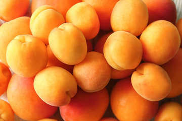 Fresh apricots as background