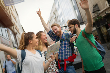 Happy young people having fun outdoors