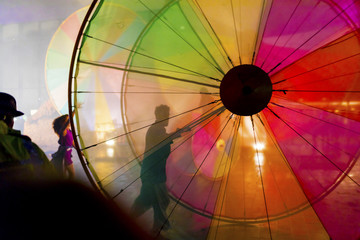 The Colour of Light, colour wheels abstract background at a festival event in the UK