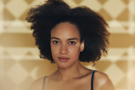 Portrait of a Beautiful Young Woman with Afro Hairstyle