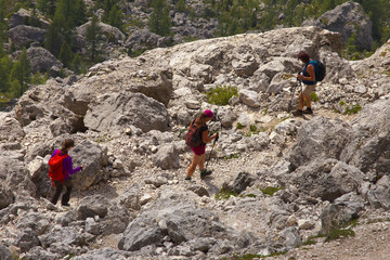 Group of walking tourists in the mountains