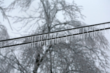Ice Hanging From Power Lines After A Heavy Winter Storm