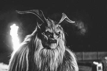 monochrome portrait of a scary looking krampus