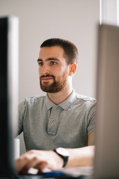 Handsome Bearded Designer Working on His Computer