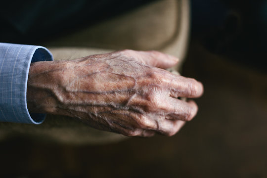 Hand of an elderly man.