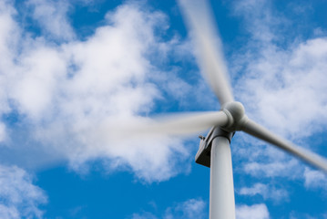 Industrial Wind Turbine Green Energy Generation on Wind Farm With Blue Sky Ontario Canada