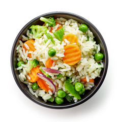 Bowl of boiled rice with vegetables