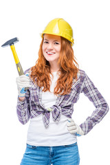 girl in yellow helmet with a hammer in plaid shirt on white background