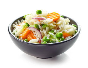 Bowl of boiled rice with vegetables