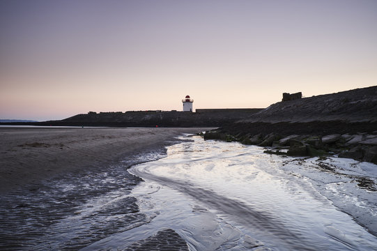 Burry Port lighthouse at twilight. Wales, UK.