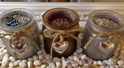 shiny jars decorated with silver hearts