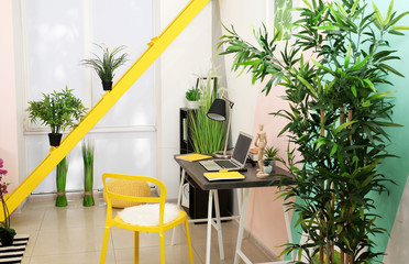 Comfortable workplace in interior of beautiful modern room