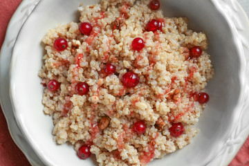Dessert with quinoa and berries on table