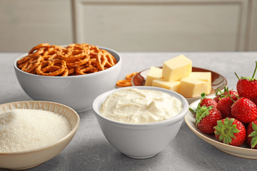 Ingredients for strawberry pretzel salad on table