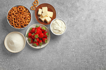 Ingredients for strawberry pretzel salad on table