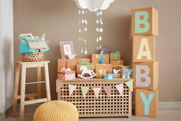 Gifts and decorations for baby shower indoors - obrazy, fototapety, plakaty