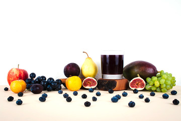 Grape juice with autumn seasonal fruits.