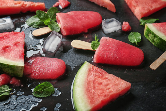 Composition with watermelon ice-cream on dark background