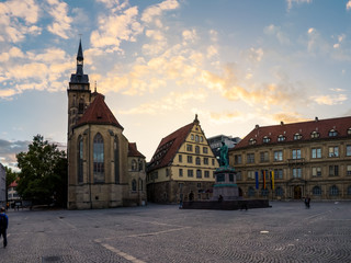 Obraz premium Powerful Aternoon Sunset Panorama over Stuttgart Schillerplatz with Tourist Walking Around Autumn October 2017