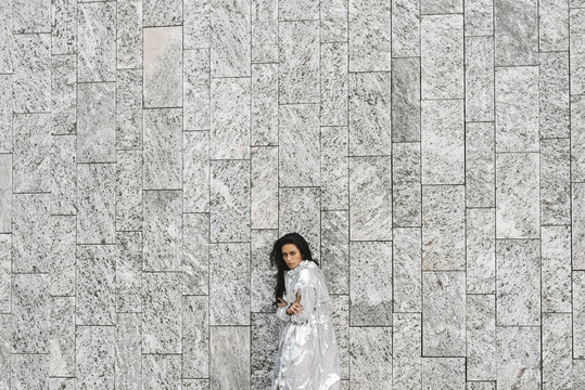 Stylish woman with a silver jacket