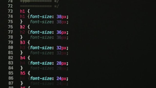 HTML and CSS code developing. Website design code programming on a laptop screen