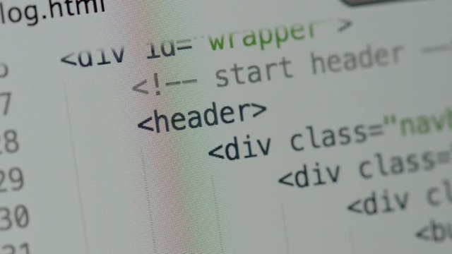 HTML and CSS code developing. Website design code programming on a laptop screen
